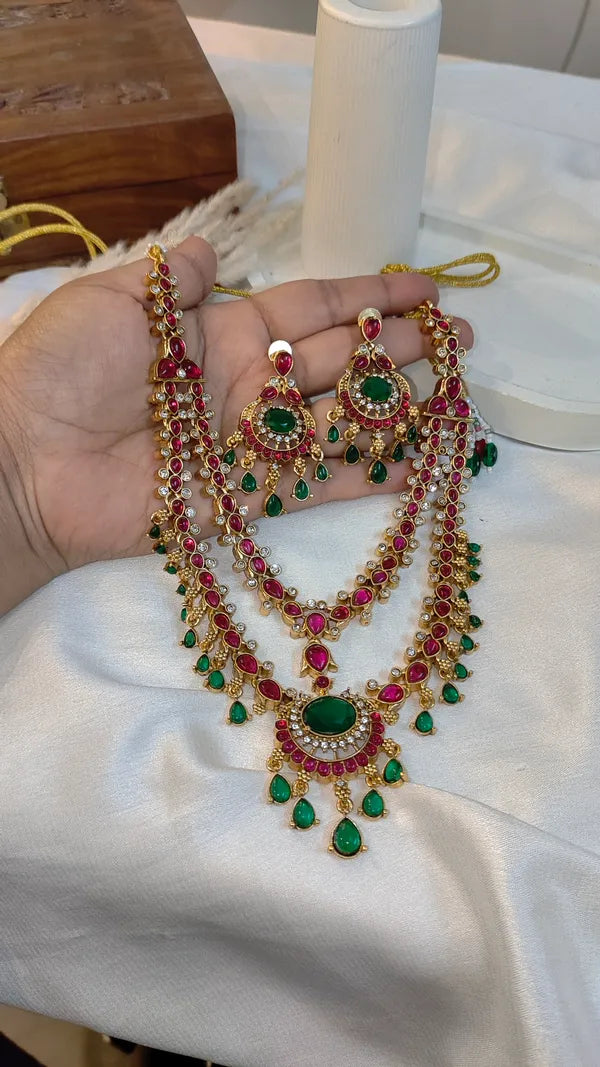 Emerald green and ruby pink stones